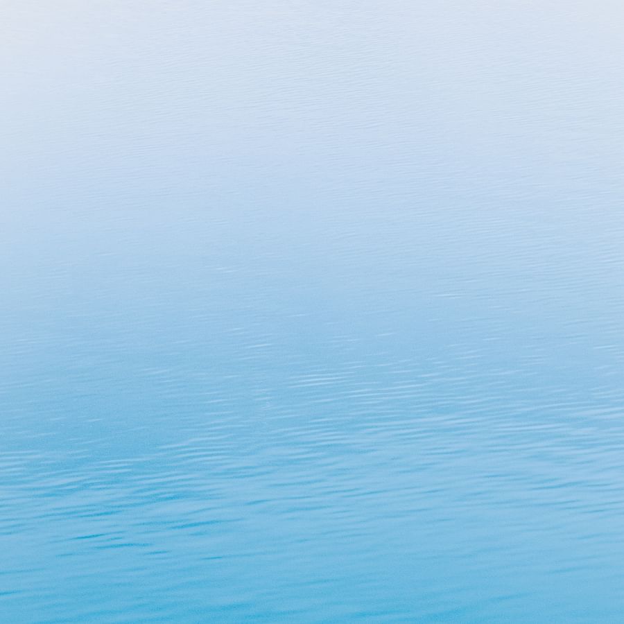 Fashionable individuals wearing different shades of blue