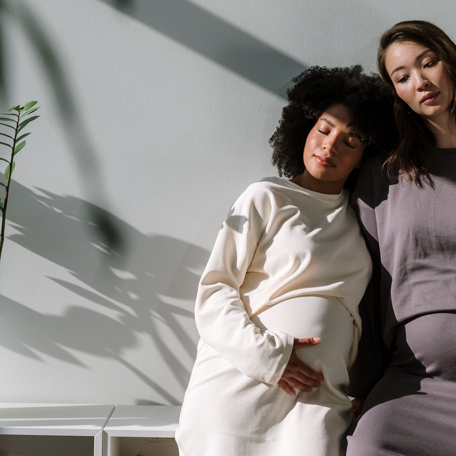 Diverse group of women showcasing dresses that complement their unique body types and color palettes